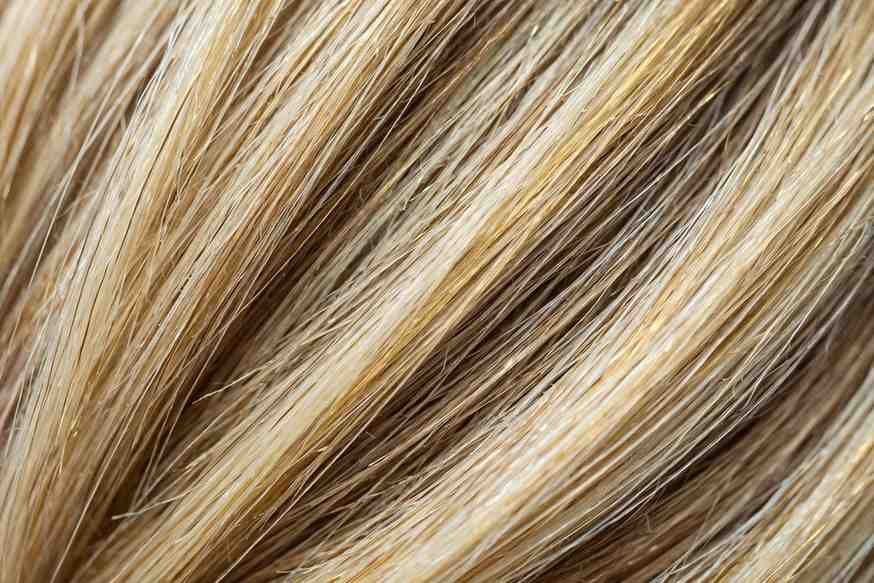 Close-up of pale gold blonde hair with dimensional color