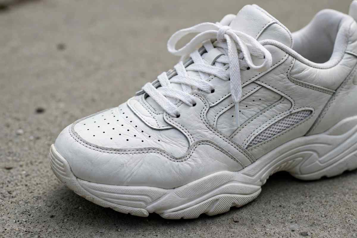 Close-up of classic white leather sneakers